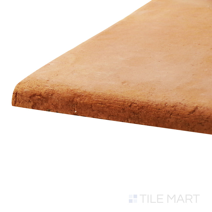 A corner perspective of the Lincoln Pavers Red 16x16 natural terracotta tile emphasizes its large format and rustic red finish, ideal for patios, walkways, and outdoor spaces.