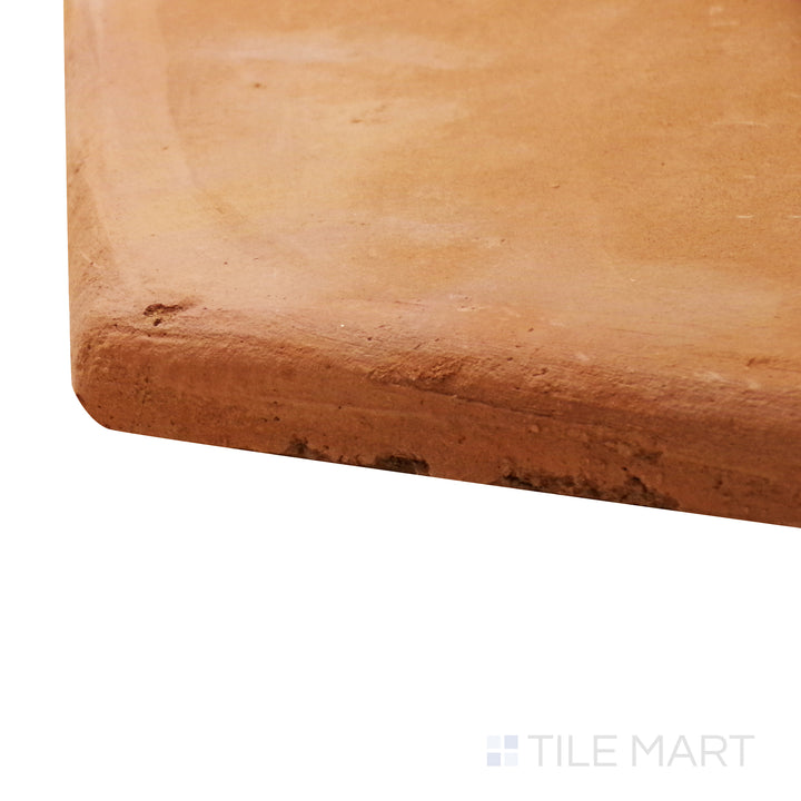 A corner shot of the Lincoln Pavers Red 8" hex natural terracotta tile highlights its hexagonal shape and textured terracotta surface, creating a timeless and artisanal look.