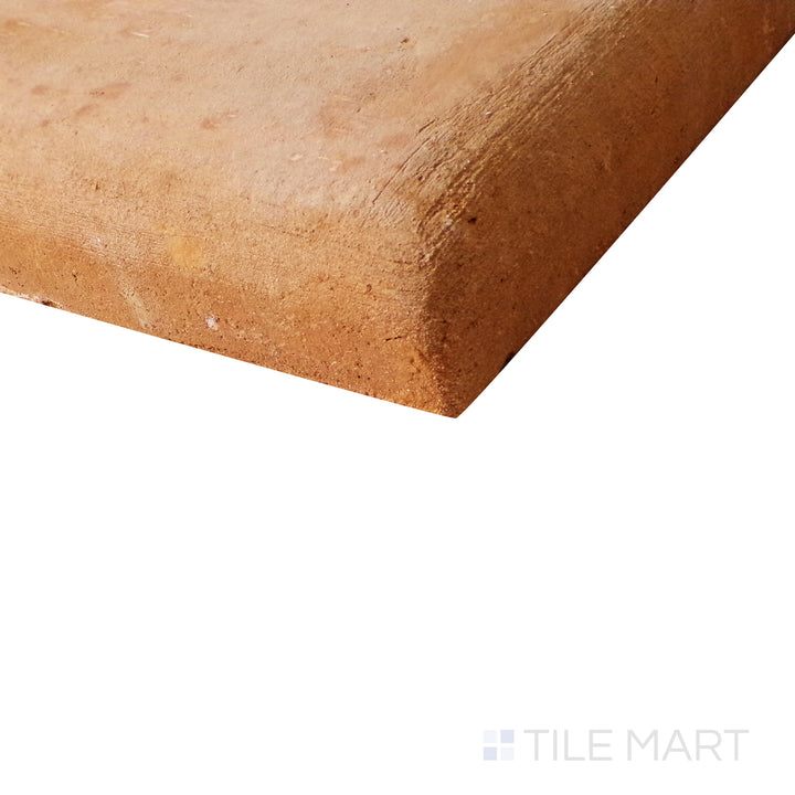 Side perspective emphasizing the sturdy build of Lincoln Pavers Red 12X12 stair coping natural terracotta tile.