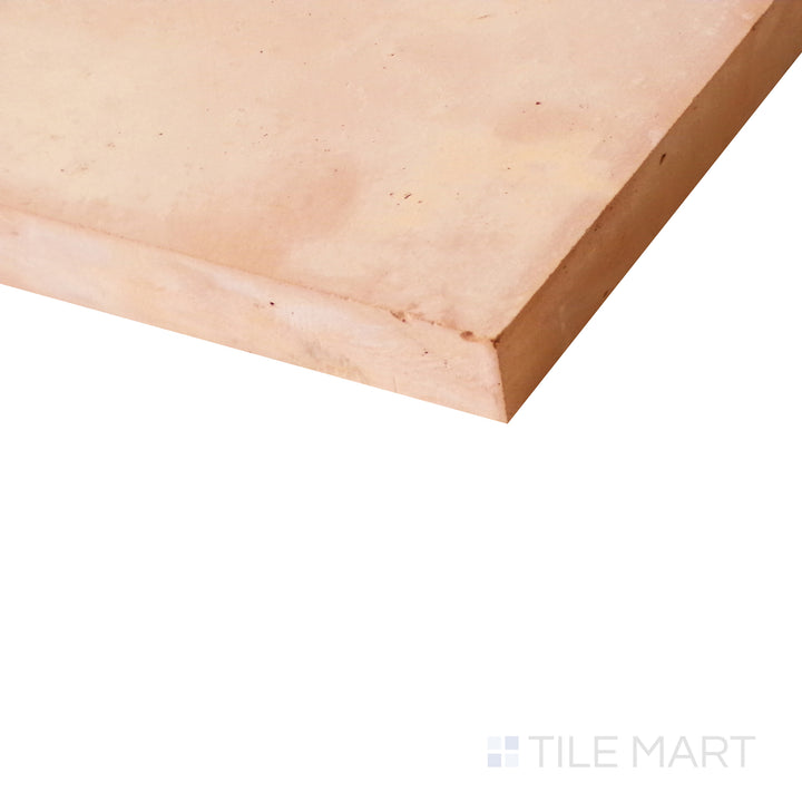 Angled shot showcasing the earthy tones of Saltillo Salmon 8X8 natural terracotta tile.