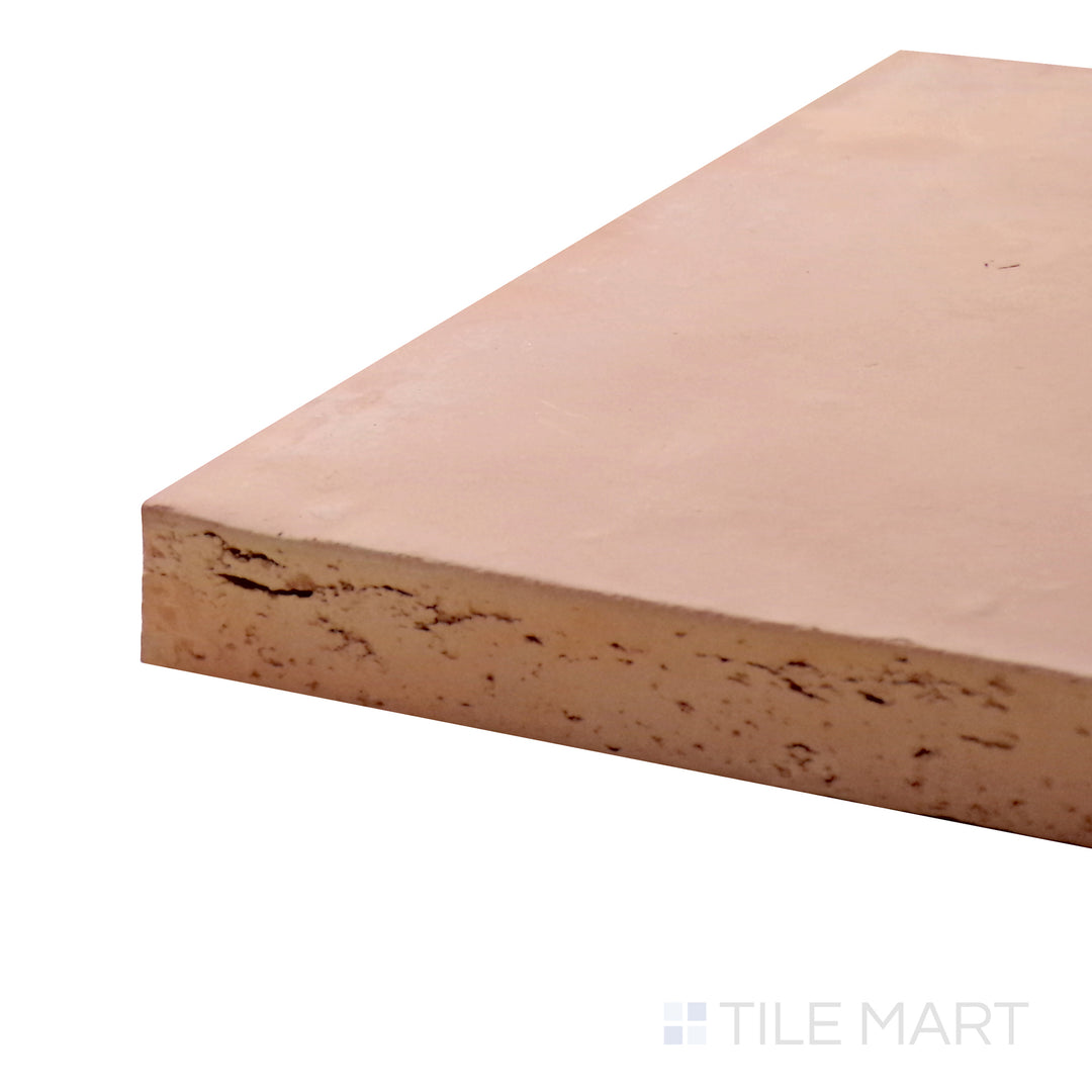 A corner shot of the Saltillo Salmon 8x8 natural terracotta tile highlights its warm earthy tones and handcrafted texture, adding a rustic and traditional charm.