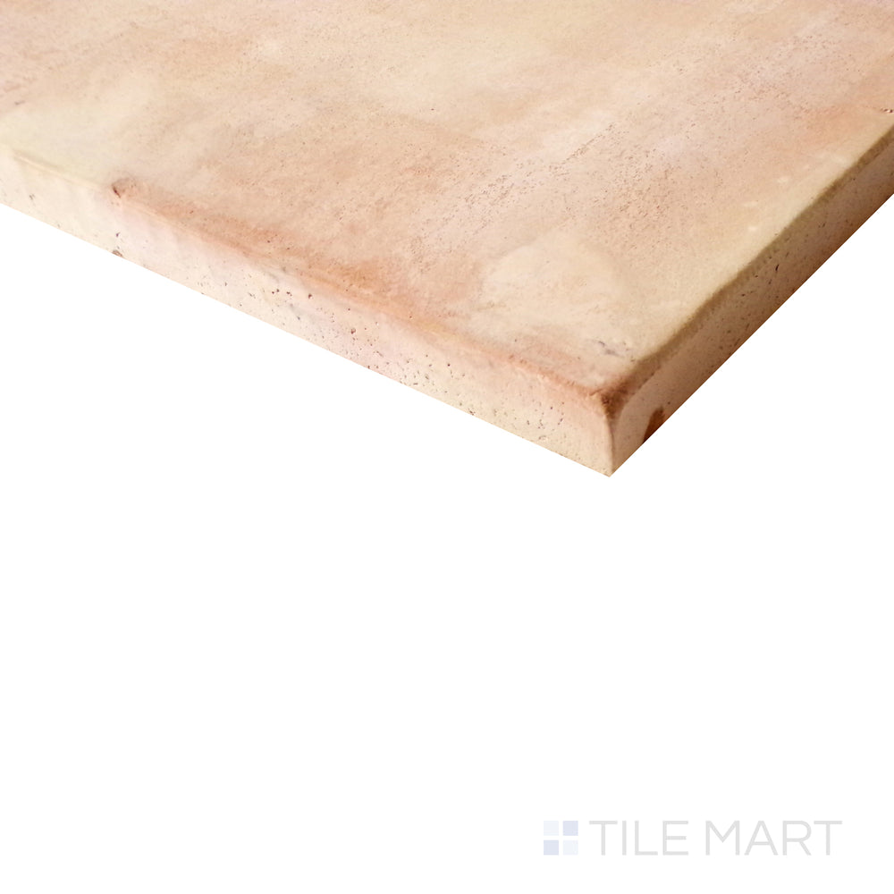 Tilted perspective capturing the rich, rustic texture of Saltillo Salmon 16X16 natural terracotta tile.