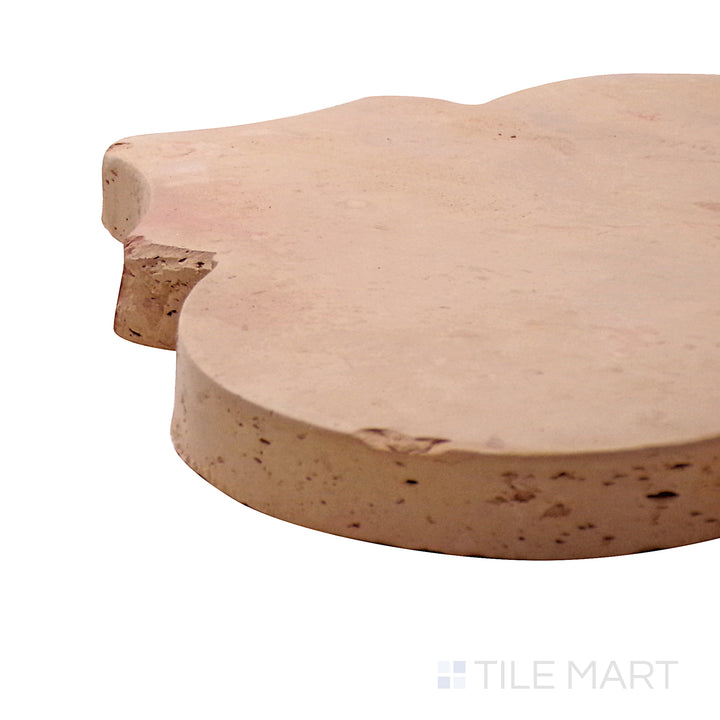 A corner perspective of the Saltillo Salmon 8x9 Riviera natural terracotta tile emphasizes its distinctive shape and raw terracotta finish, offering a classic and aged appeal.