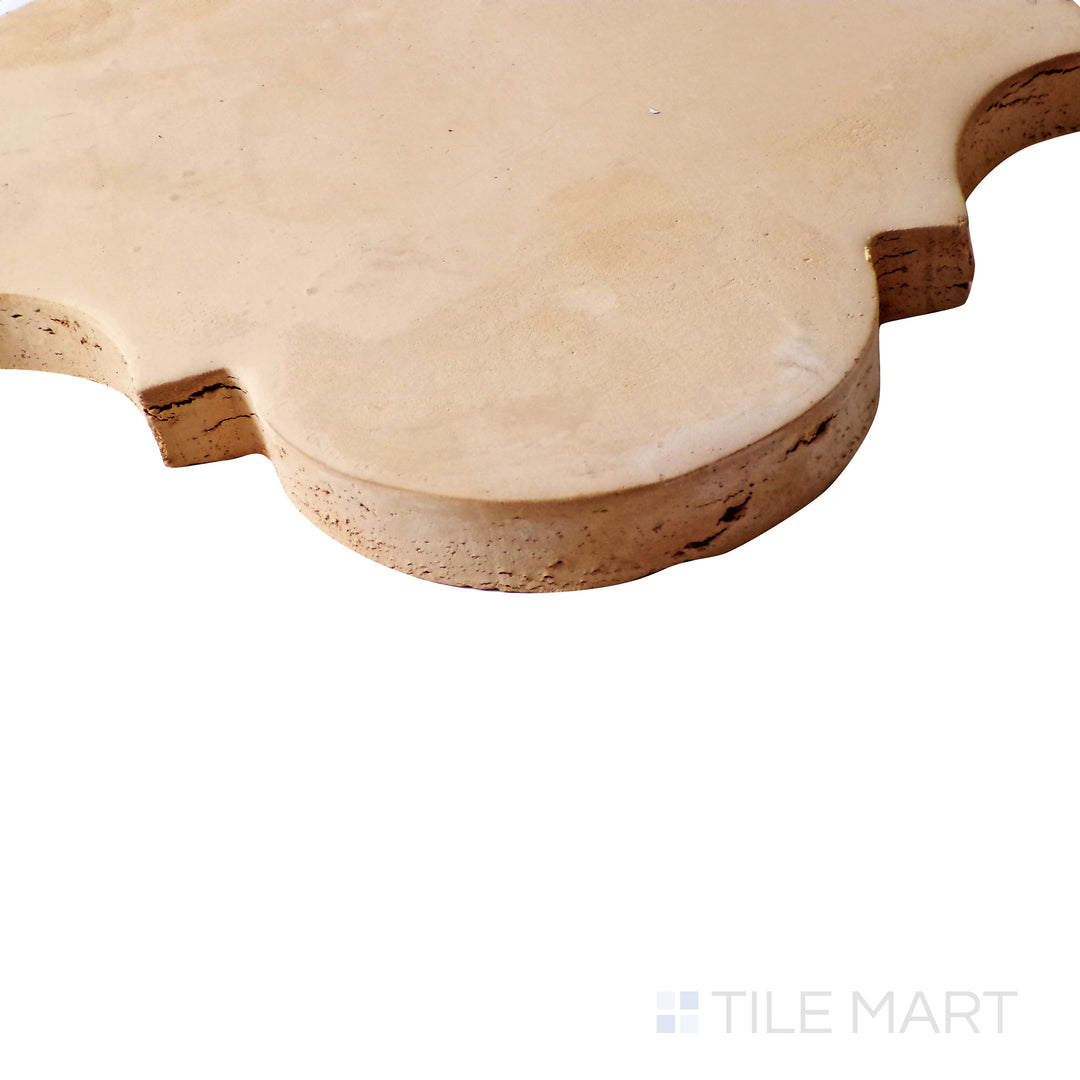 Side view focusing on the elegant San Felipe curves of Saltillo Salmon 9X11 natural terracotta tile.