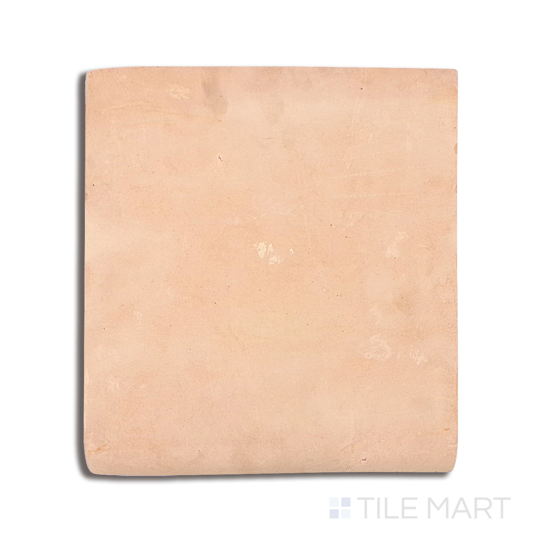 Flat lay of Saltillo Salmon 12X12 Stair Coping Natural Terracotta, featuring a smooth rounded edge for seamless stair transitions.