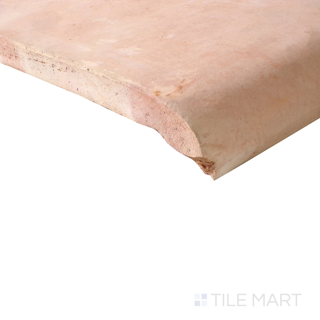 Close-up perspective capturing the detailed craftsmanship of Saltillo Salmon 12X12 stair coping natural terracotta tile.