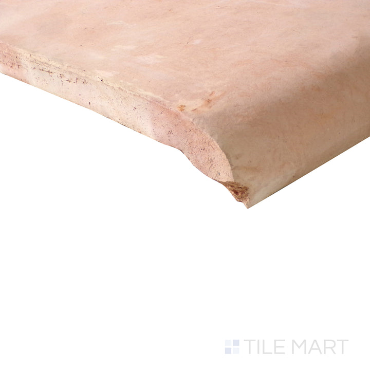 Close-up perspective capturing the detailed craftsmanship of Saltillo Salmon 12X12 stair coping natural terracotta tile.