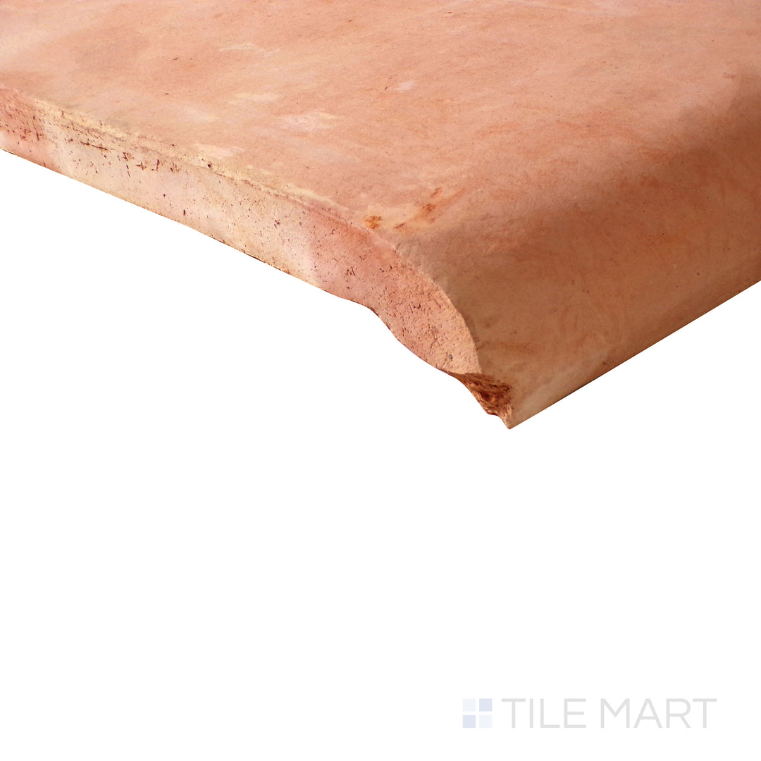 Angled shot showcasing the smooth stair corner design of Saltillo Salmon 12X12 stair coping corner natural terracotta tile.