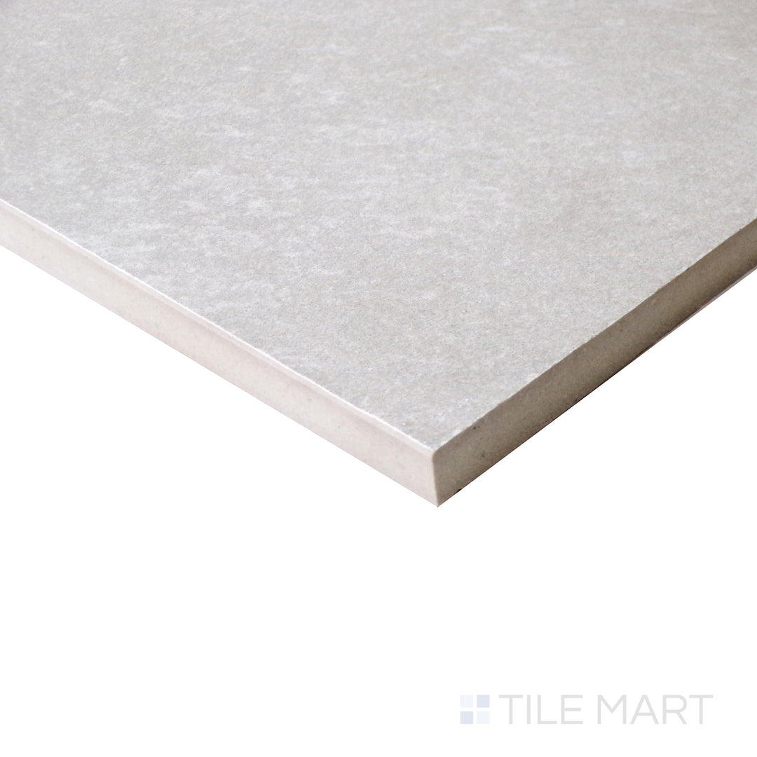 Side perspective showcasing the cool, neutral shades of Nordika Grey 24X48 matte porcelain tile.