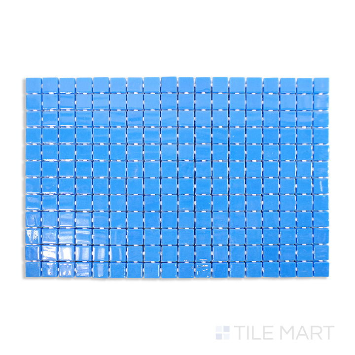 Top-down shot of Lisa Azul Celeste 1" Square Glossy Glass Mosaic, displaying vibrant blue glass tiles with a sleek, glossy surface.