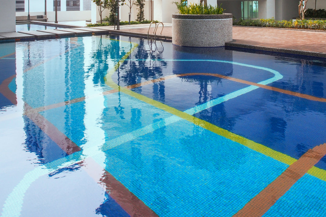 A serene and refreshing ambiance featuring Lisa Azul Claro 1" square glossy glass mosaic, reflecting light beautifully for a vibrant aesthetic.