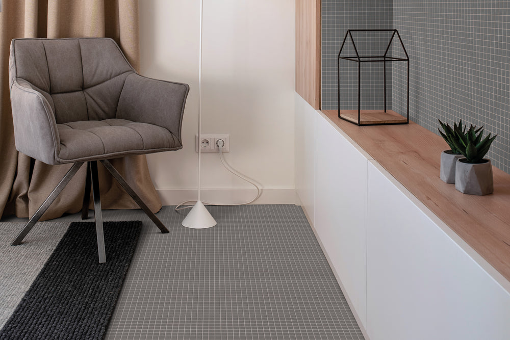 A stylish and neutral-toned space featuring Natureglass Malla Grey 1