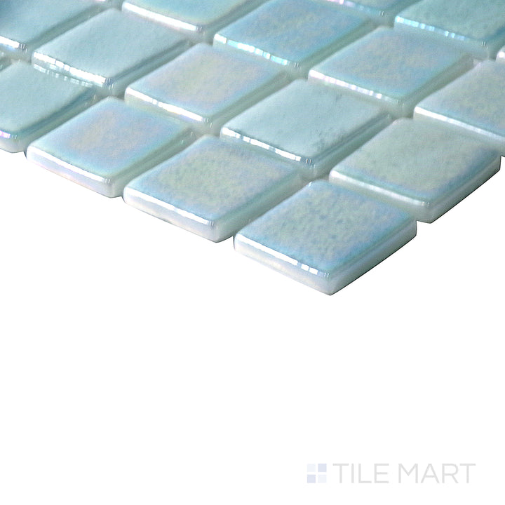 Angled perspective emphasizing the fresh, nature-inspired tones of Opalescent Claro Verde 1" square glossy glass mosaic.