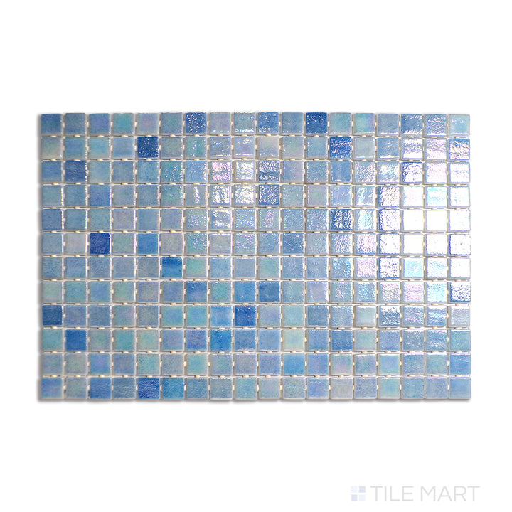 A dynamic blend of blue hues forms this glossy glass mosaic, meticulously arranged in a 1-inch square grid, shown from above to highlight its texture.