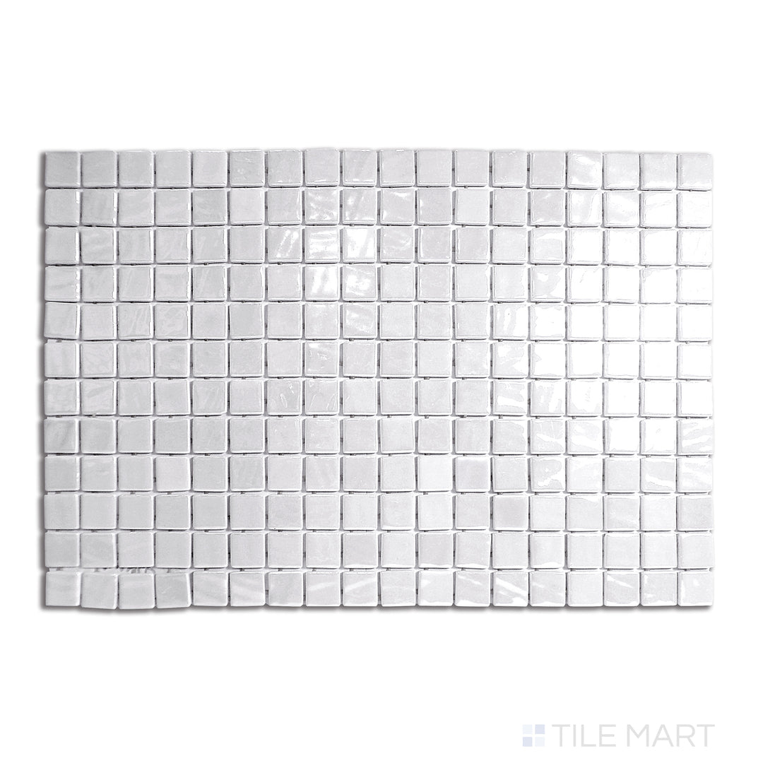 Pure white opalescent glass squares create a luminous mosaic, carefully arranged in a uniform grid and displayed from a top-down perspective.