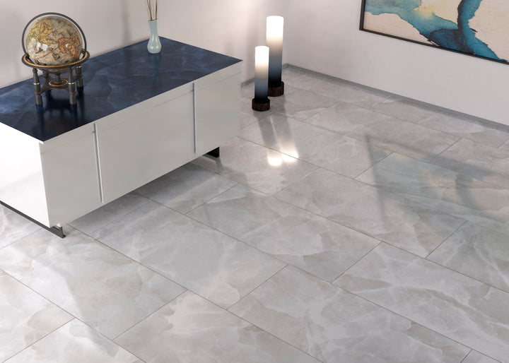 A sophisticated and luminous setting featuring Onyx White 24X48 polished porcelain, perfect for creating a spacious and refined look.