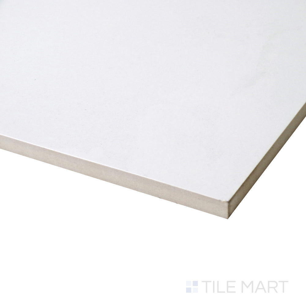 Angled close-up showcasing the soft matte finish of Pearl Super White 12X24 porcelain tile.