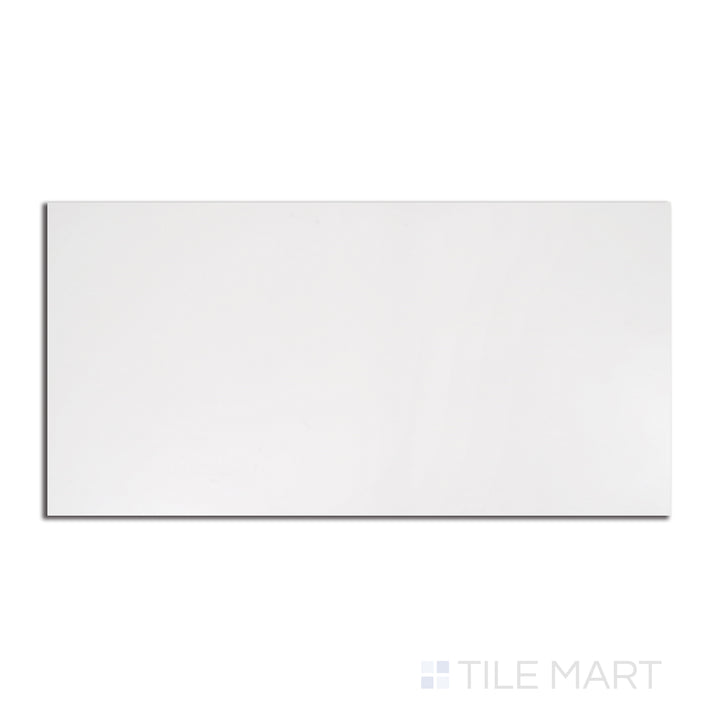 A rectangular 12x24 matte porcelain tile in bright Pearl Super White, displayed from a bird’s-eye perspective to highlight its smooth, refined surface.