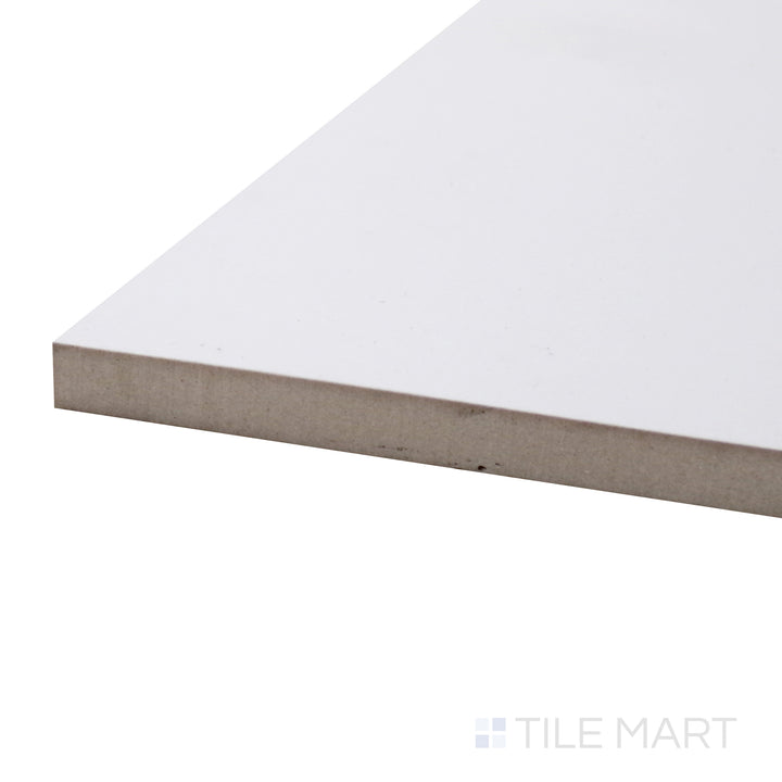 Captured from a corner angle, the Pearl Super White 24x24 matte porcelain tile showcases its crisp white tone and velvety matte texture, ideal for contemporary spaces.