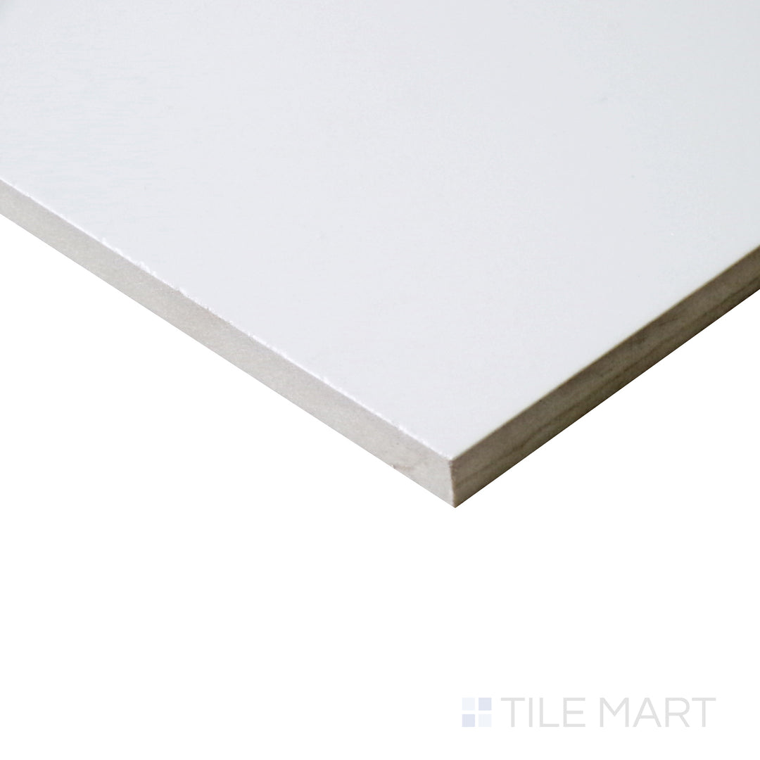 Tilted shot highlighting the expansive format of Pearl Super White 24X48 matte porcelain tile.