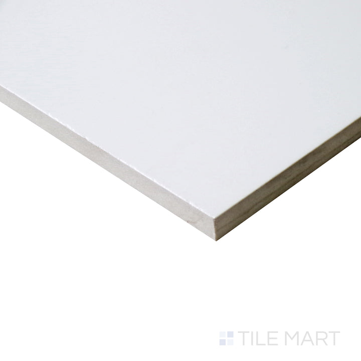 Tilted shot highlighting the expansive format of Pearl Super White 24X48 matte porcelain tile.