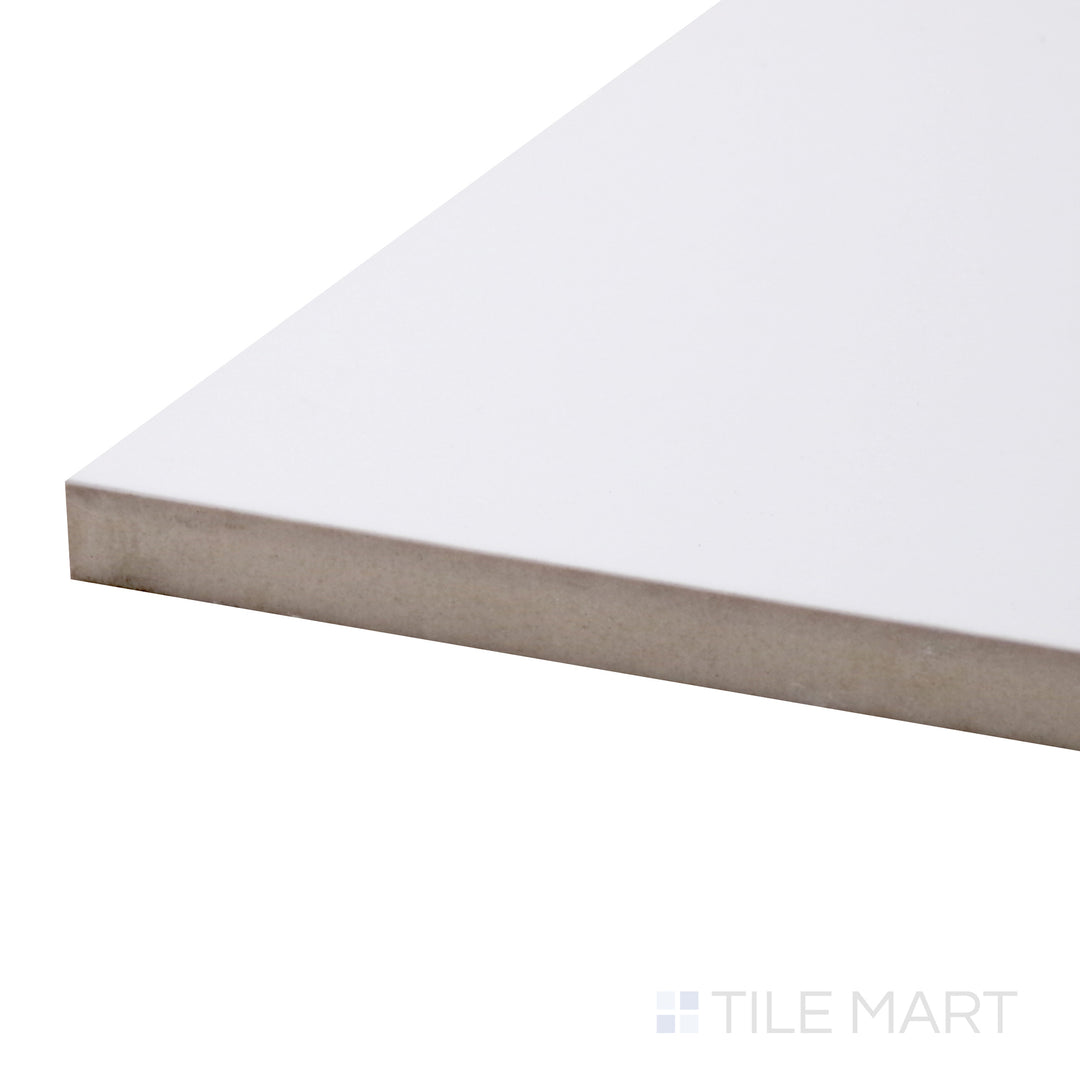 A corner perspective of the Pearl Super White 24x48 matte porcelain tile emphasizes its large format and subtle texture, offering a sleek and seamless look.