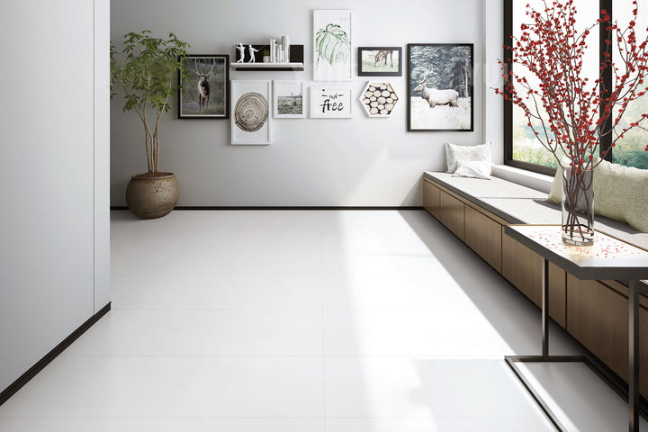 A soft and inviting ambiance featuring Pearl Super White 24X48 matte porcelain, offering a seamless blend of elegance and contemporary style.