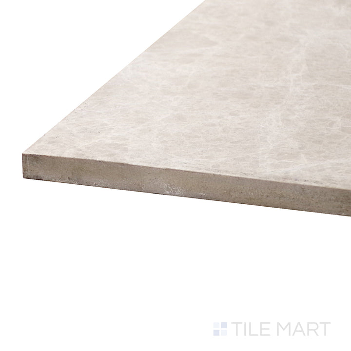 Captured from a corner angle, the Polished Marble Emperador Light 48x48 porcelain tile showcases its warm beige tones and smooth polished finish, enhancing spaces with a natural elegance.