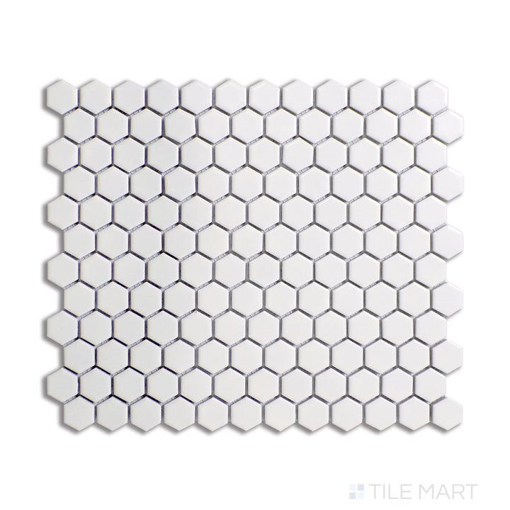 A crisp white 1-inch hexagonal matte porcelain mosaic tile, structured in a symmetrical honeycomb layout, captured from a bird’s-eye perspective.