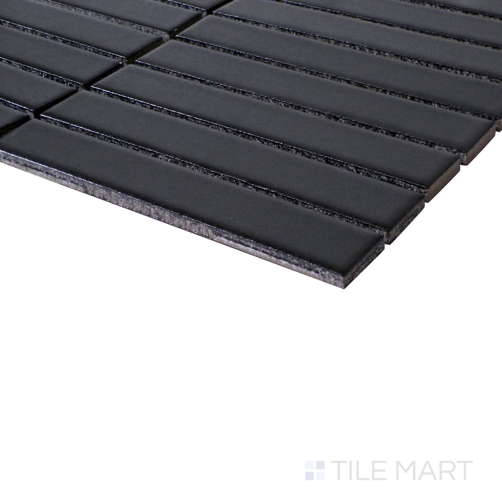 Angled close-up highlighting the deep, bold finish of Porcelain Glazed Black Grid Matte mosaic.