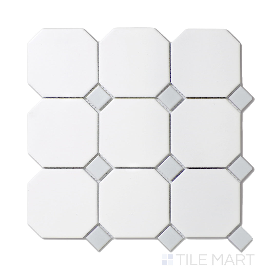 Flat-lay view of 4-inch octagon mosaic tiles in white porcelain, highlighted by gray dot detailing, finished with a sleek matte surface.