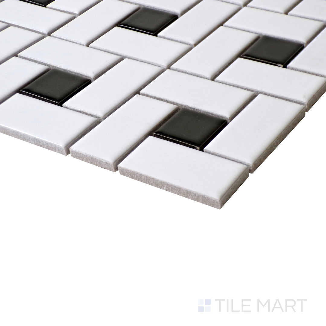A detailed angled view of White Pinwheel Matte mosaics with bold Black Dot accents, creating a striking geometric pattern.
