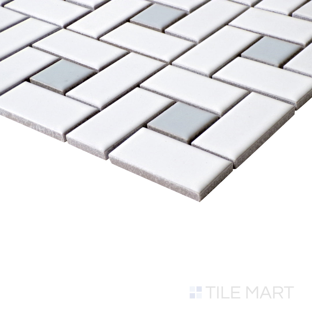 Tilted perspective emphasizing the classic elegance of Porcelain Glazed White With Gray Dot Pinwheel Matte mosaic.