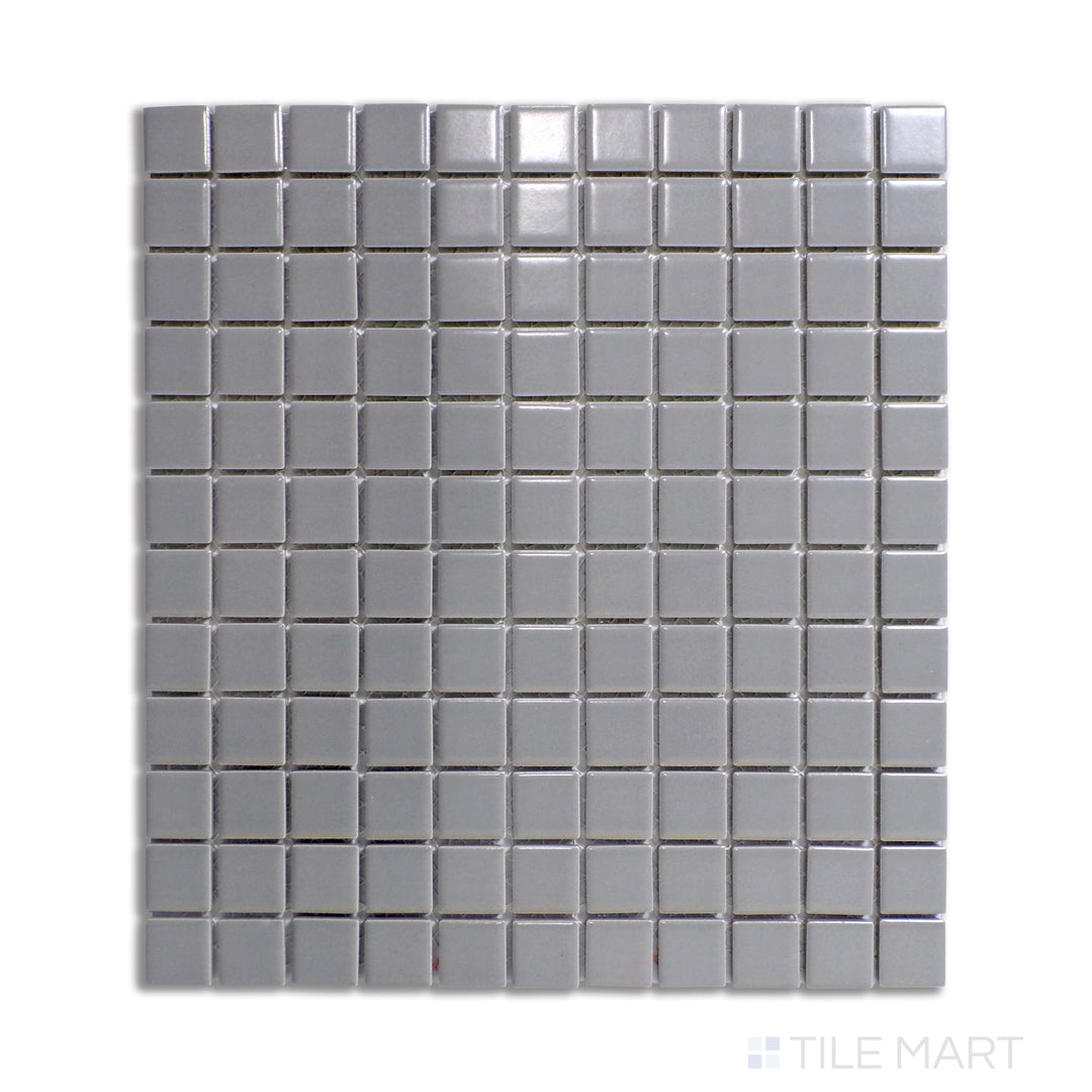 Flat-lay image of gray square porcelain mosaic tiles with a matte finish, offering a sleek and modern surface.