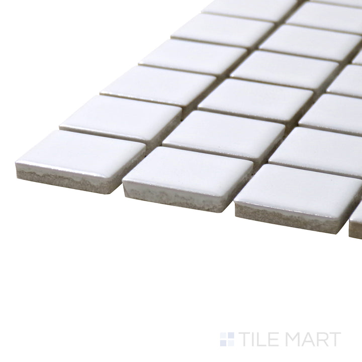 A corner perspective of the Porcelain Glazed Mosaics White 1" Square Matte tile highlights its bright white surface and classic square design, offering a timeless appeal.