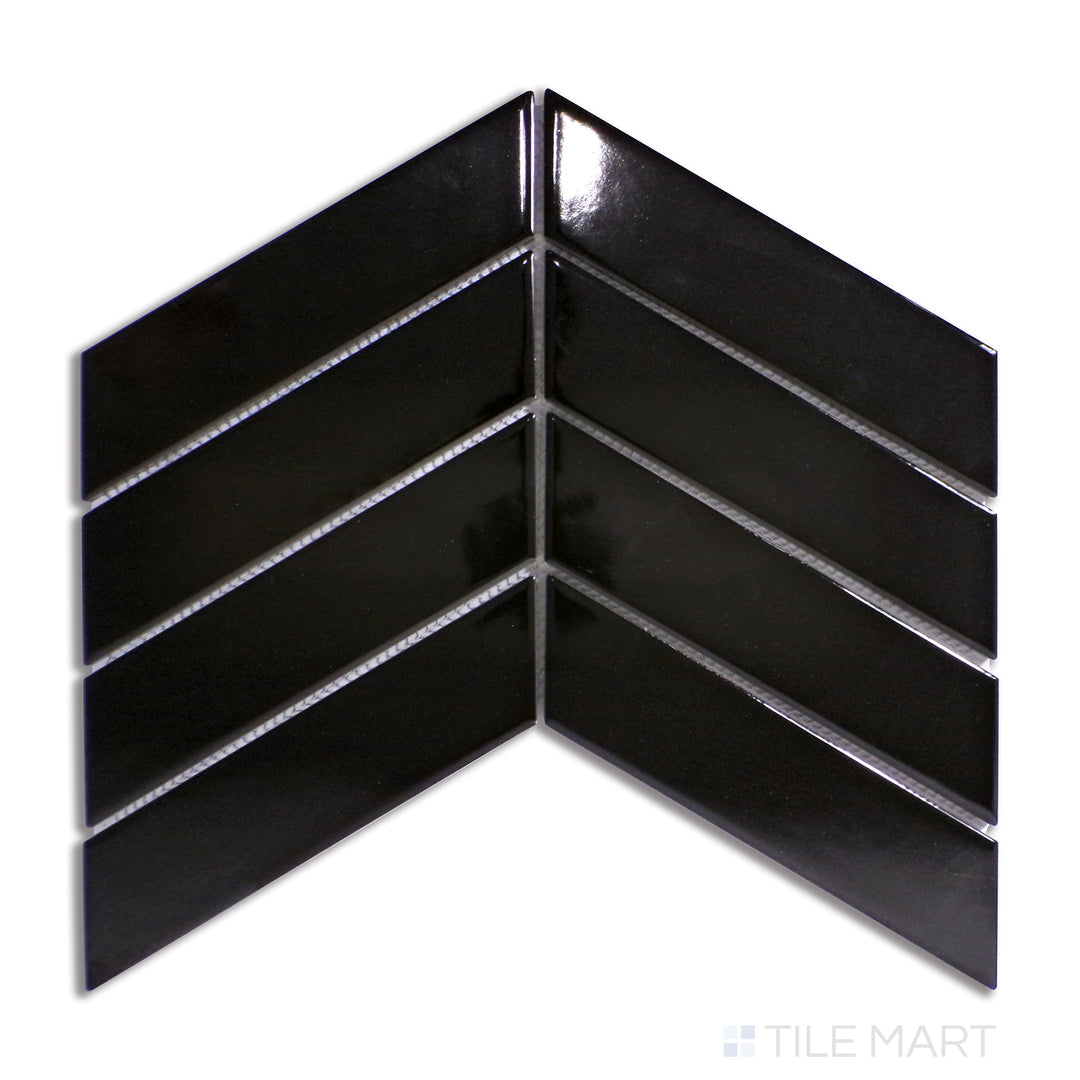 Aerial view of glossy black chevron-patterned porcelain mosaic tiles, reflecting light for a dynamic effect.