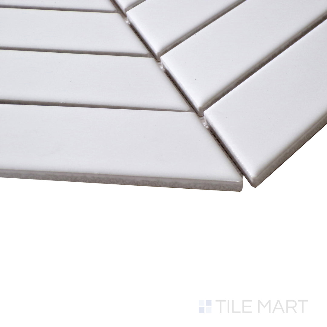 Angled shot highlighting the deep, reflective surface of Black Chevron Glossy Porcelain Mosaic, adding bold contrast to any design.