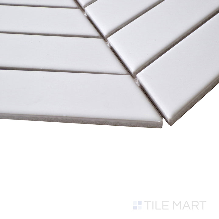 Angled shot highlighting the deep, reflective surface of Black Chevron Glossy Porcelain Mosaic, adding bold contrast to any design.