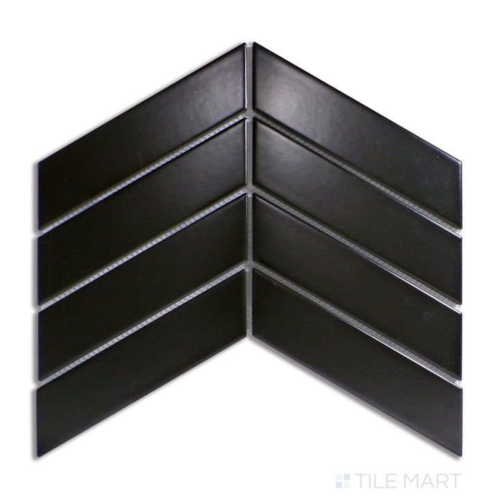 Overhead shot of matte black chevron porcelain mosaic tiles, forming a bold geometric pattern with a modern edge.