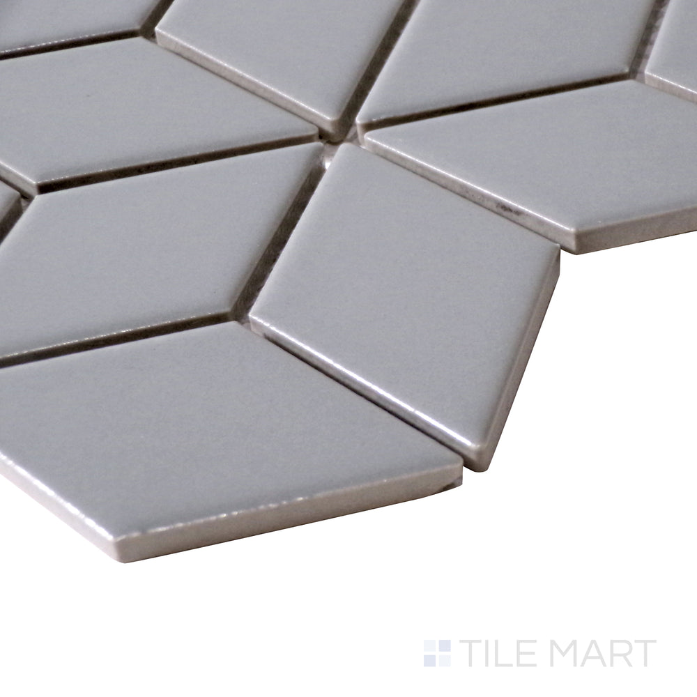 A close-up angled perspective of Light Gray Cube Matte Porcelain Mosaic, showcasing its soft, understated finish and geometric elegance.