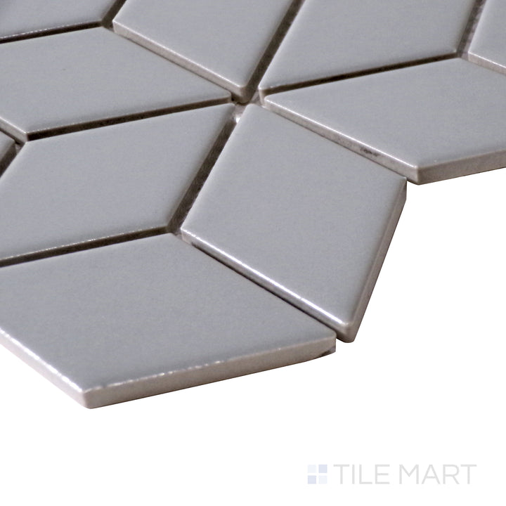 A close-up angled perspective of Light Gray Cube Matte Porcelain Mosaic, showcasing its soft, understated finish and geometric elegance.