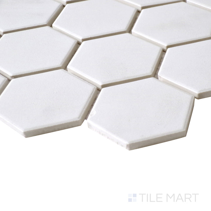 A clean, modern perspective capturing the crisp edges and matte white surface of Solids White 2" Hexagon Porcelain Mosaic.