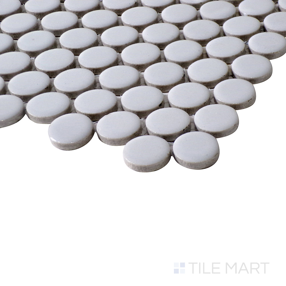Side shot highlights the cool grey tones and velvety matte finish of Pure Grey Penny Round Matte Porcelain Mosaic, creating a refined aesthetic.