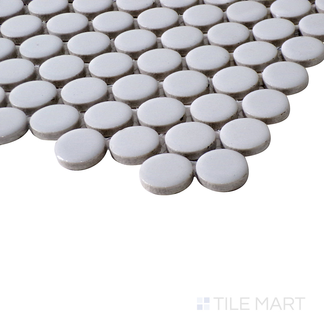 Side shot highlights the cool grey tones and velvety matte finish of Pure Grey Penny Round Matte Porcelain Mosaic, creating a refined aesthetic.