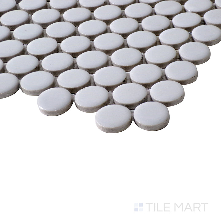 Side shot highlights the cool grey tones and velvety matte finish of Pure Grey Penny Round Matte Porcelain Mosaic, creating a refined aesthetic.
