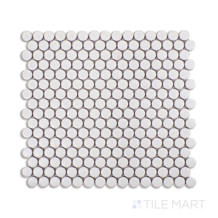 Overhead image of matte gray penny round porcelain mosaic tiles, offering a subdued elegance with a soft finish for a versatile interior accent.