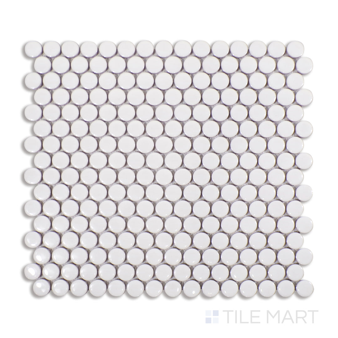 Top-down view of matte white penny round porcelain mosaic tiles, providing a smooth, structured design that complements both classic and modern interiors.
