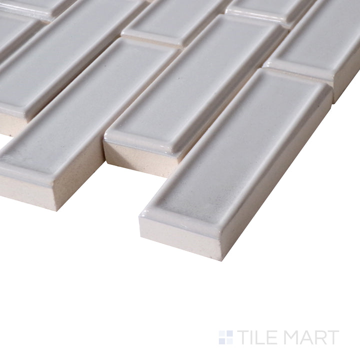 Close-up captures the shimmering surface of Roxy Moonstone Brick Glossy Porcelain Mosaic, emphasizing its subtle veining and luminous effect.