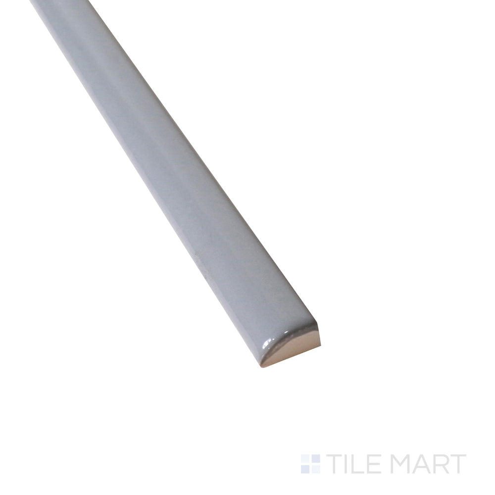 Close-up angle showcases the elegant trim of Roxy Hematite 0.5X9 Glossy Porcelain Pencil, accentuating the smooth and lustrous finish.