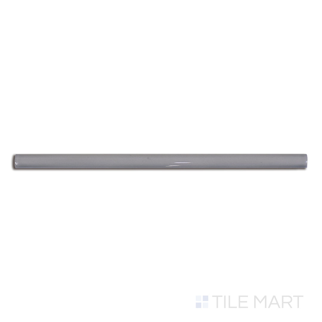 Top-down view of Roxy Hematite 0.5x9 glossy porcelain pencil tile, a slim and polished border option ideal for accenting contemporary tile layouts.